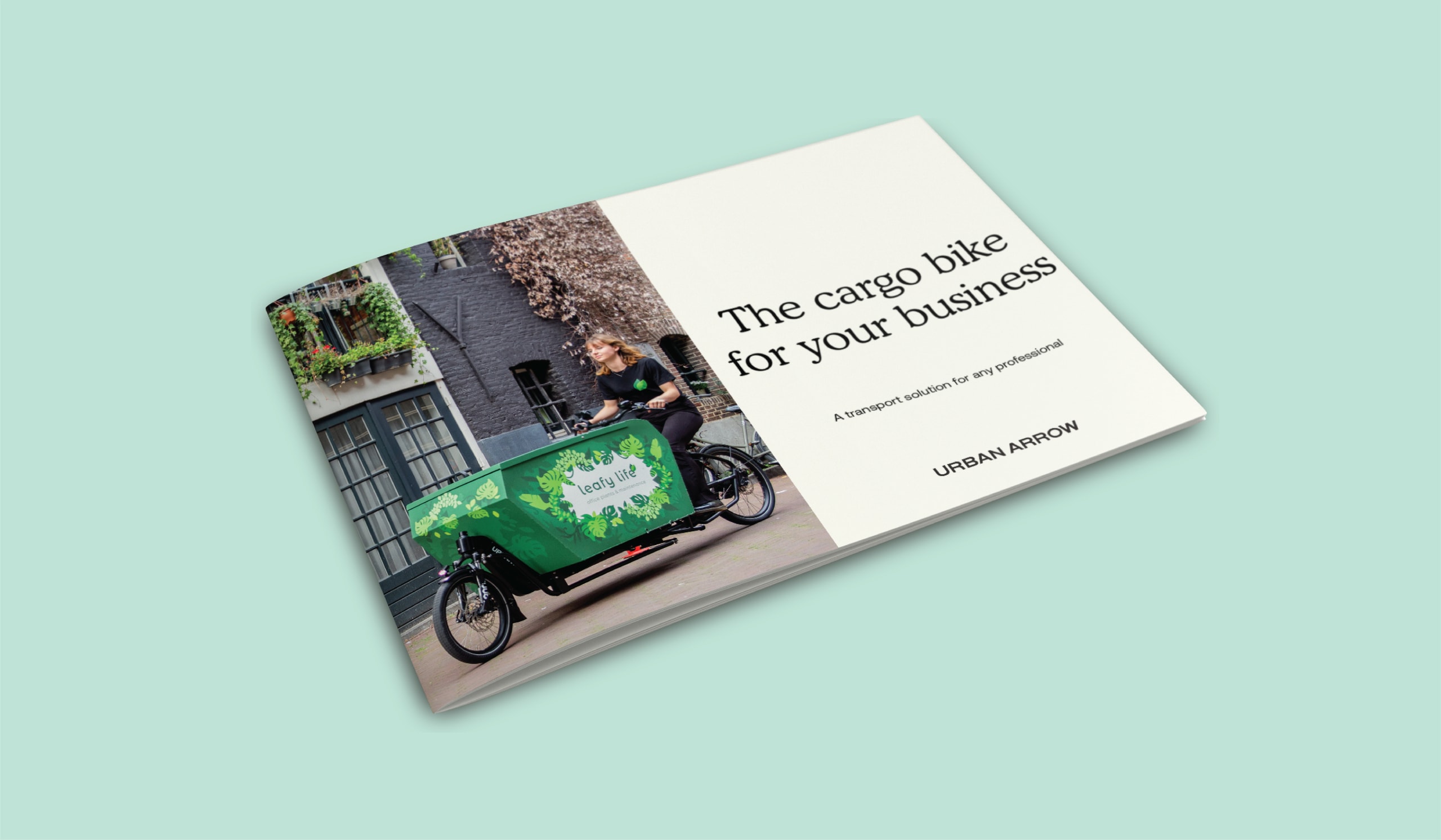 A brochure featuring a cargo bike with a green and white design, ridden by a person in an urban setting. The text reads, The cargo bike for your business - A transport solution for any professional and URBAN ARROW.